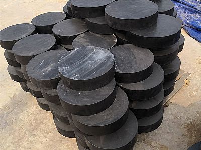 平邑县板式橡胶支座由若干层橡胶片与薄钢板经加压硫化